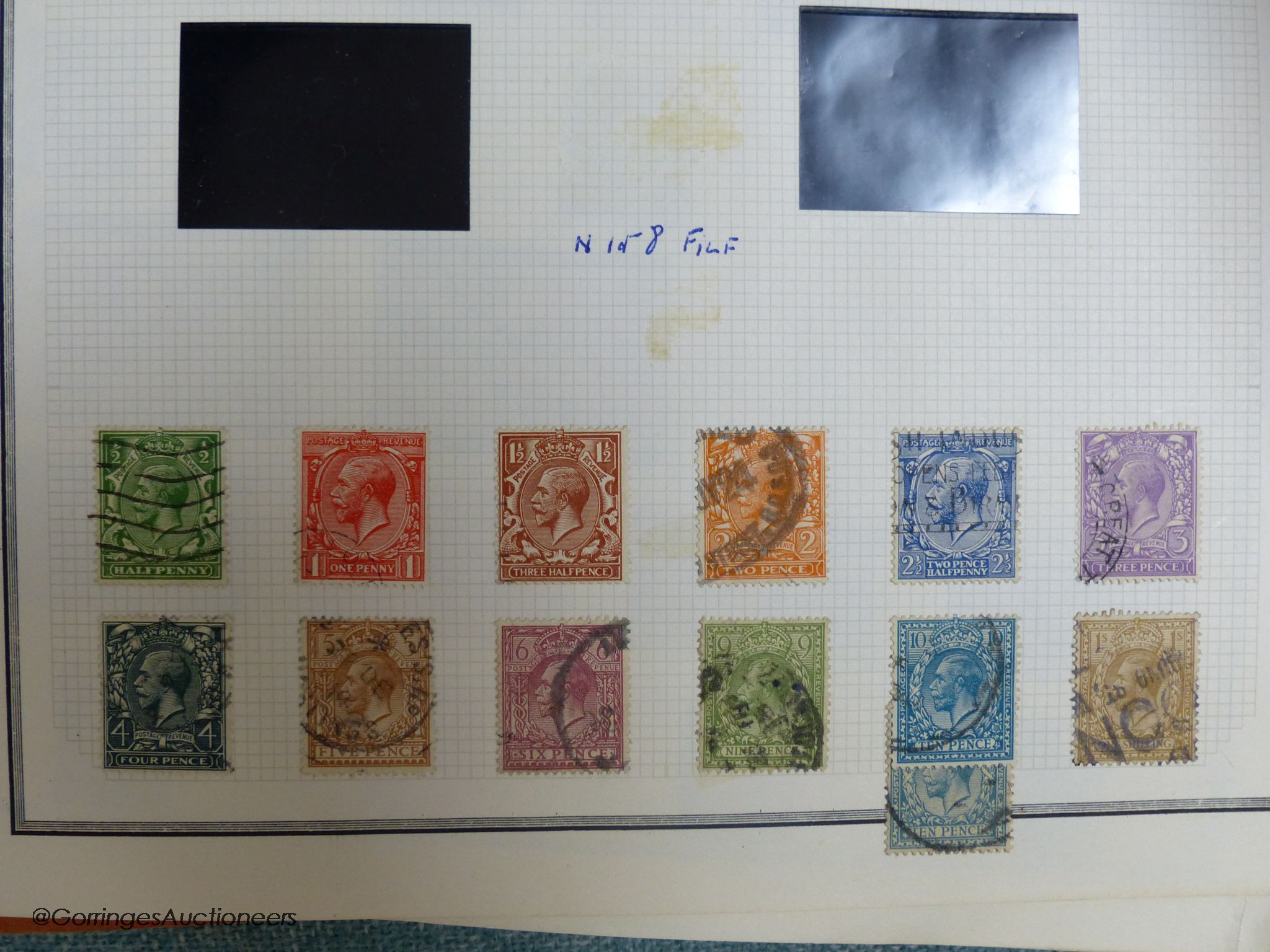 A folder containing early GB stamps